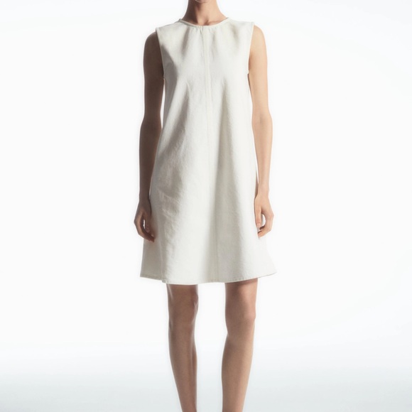 cos white denim dress COS Women's Flared Denim Mini Dress in White | Cotton